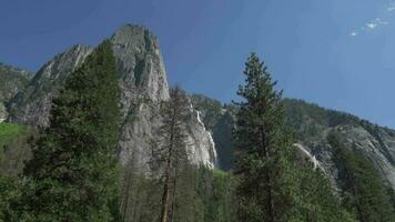 Sentinel Falls a long series of cascades descending into Yosemite Valley alongside Sentinel Rock video