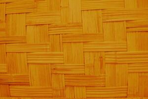 Bamboo weave texture background orange vintage filter effect. Closeup bamboo weave texture background photo