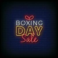 Neon Sign boxing day sale with brick wall background vector