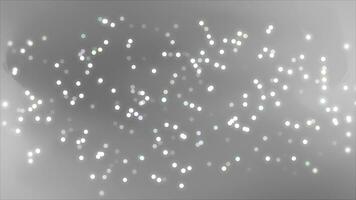 Black and White glowing glitter bokeh particles elegant particles background. Futuristic glittering particle Black and White background video