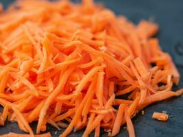 grated carrot close up view photo