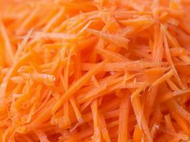 grated carrot close up view photo