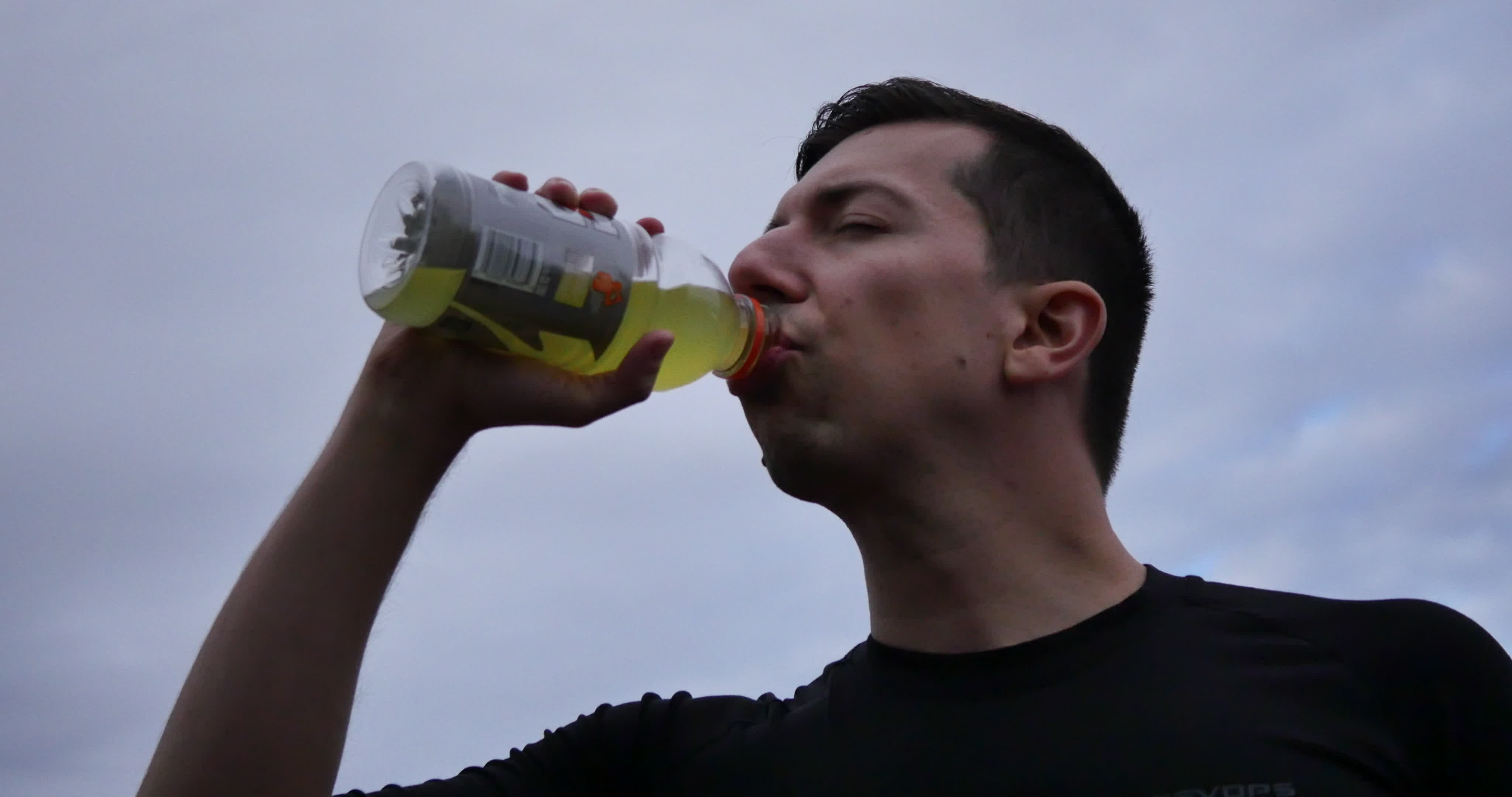 Drinking Electrolytes During Exercise 29471912 Stock Video at Vecteezy