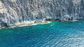 Large rock formations that look like Los Gigantes right on the atlantic ocean on the Canary Island of Tenerife. video