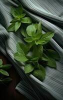 Fresh organic mint leaves ready for cooking on the kitchen table. Created with Generative AI technology. photo