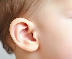 Photographer of a child's ear. Macro photography of the outer ear. Clean human ear close up on man head. Closeup of a girl ear. Created with Generative AI technology. photo