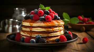 Inviting stack of pancakes adorned with syrup and berries on rustic table photo
