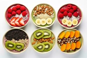 Nutritious smoothie bowls with vibrant fruits seeds and nuts isolated on a white background photo