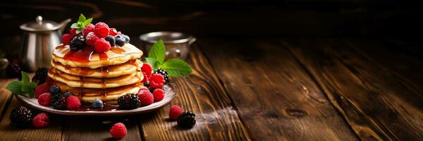Inviting stack of pancakes adorned with syrup and berries on rustic table photo