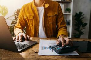 Business Man Financial Inspector and Secretary Making Report, Calculating or Checking Balance. Internal Revenue Service Inspector Checking Document Audit Concept photo