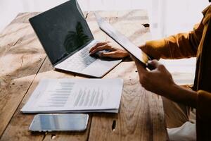 Business Man Financial Inspector and Secretary Making Report, Calculating or Checking Balance. Internal Revenue Service Inspector Checking Document Audit Concept photo