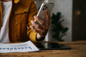 Business Man Financial Inspector and Secretary Making Report, Calculating or Checking Balance. Internal Revenue Service Inspector Checking Document Audit Concept photo