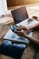 Business Man Financial Inspector and Secretary Making Report, Calculating or Checking Balance. Internal Revenue Service Inspector Checking Document Audit Concept photo