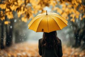 espalda ver de encantador mujer con amarillo paraguas en otoño lluvioso día. generativo ai foto