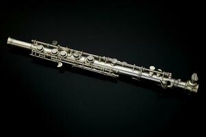 soprano saxophone on a black background, close-up. ai generated pro photo