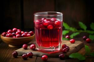 Cranberry juice in a glass and fresh cranberries on a wooden table. ai generated photo