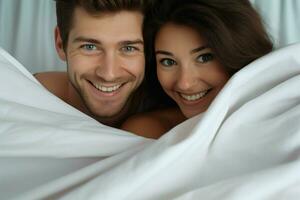 Young couple in bed. Happy young couple lying in bed and looking at camera. ai generated  pro photo