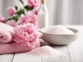 Spa set of spa treatment elements on white wooden,Peonies White towel,pink herbal salt.Generative Ai. photo