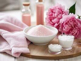 Spa set of spa treatment elements on white wooden,Peonies White towel,pink herbal salt.Generative Ai. photo