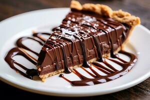 Chocolate pie with chocolate syrup photo