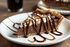 Chocolate pie with chocolate syrup photo