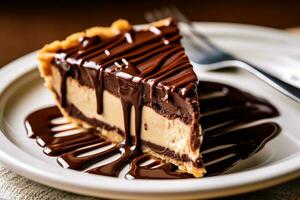 Chocolate pie with chocolate syrup photo