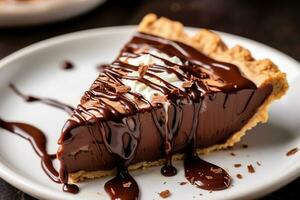 Chocolate pie with chocolate syrup photo