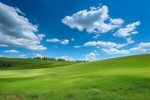 Green meadows on hill with blue sky photo