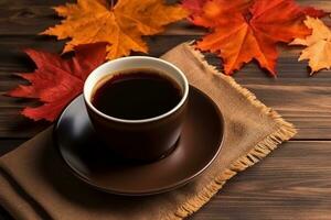 caliente café con otoño hoja en de madera antecedentes foto