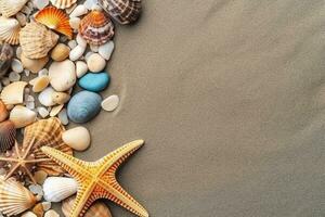 Top view of sandy beach with shells and starfish photo