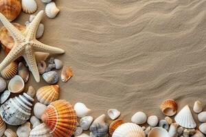 Top view of sandy beach with shells and starfish photo