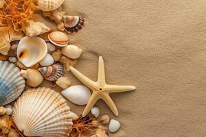 Top view of sandy beach with shells and starfish photo