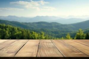 Empty wooden table with mountain view and blue sky background photo