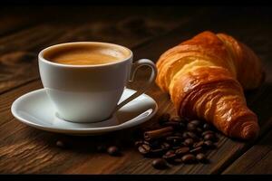White coffee cup and fresh croissants on wooden background photo