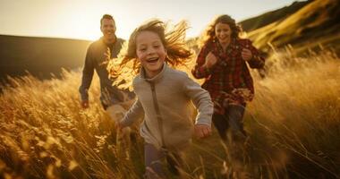 Happy family in running in summer field photo