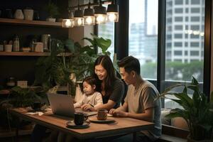 Young family using laptop photo