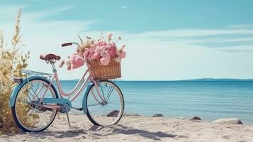 Bicycle with a basket sits on top of sand near the ocean photo