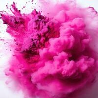 Pink Holi paint splash isolated. photo