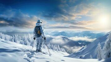 Man in ski goggles rides a snowboard from a snowy mountain photo