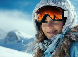 Skateboarder girls snowboarding on top of mountain photo