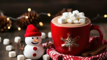 A christmas mug of hot chocolate with little snowman shaped marshmallows photo