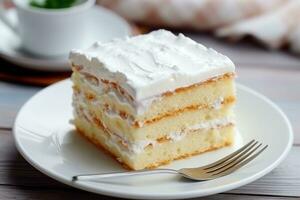 White bunk cake lies on the table photo