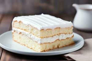 White bunk cake lies on the table photo