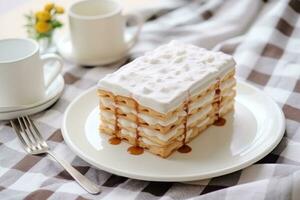 White bunk cake lies on the table photo