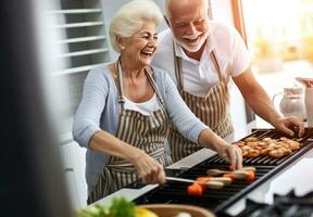 Old couple cooking at the kitchen photo