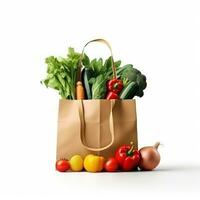 Fresh vegetables in paper bag isolated photo