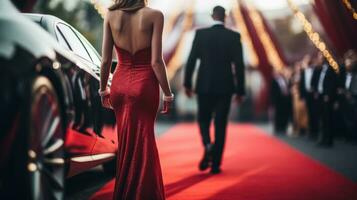 Celebrities arriving with limousine walking red carpet photo