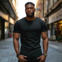 Man in black t-shirt mockup posing in the street photo