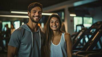 Young couple in sport gym photo