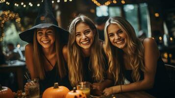 Friends laughing while carving pumpkins photo